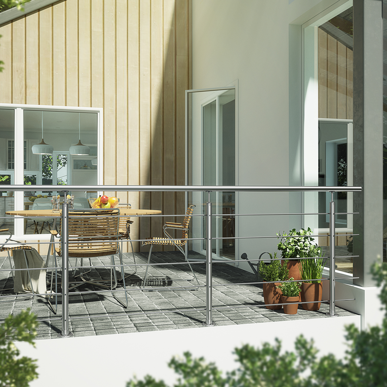 Patio elegante con parapetto in acciaio inossidabile, tavolo in legno e piante in vaso.